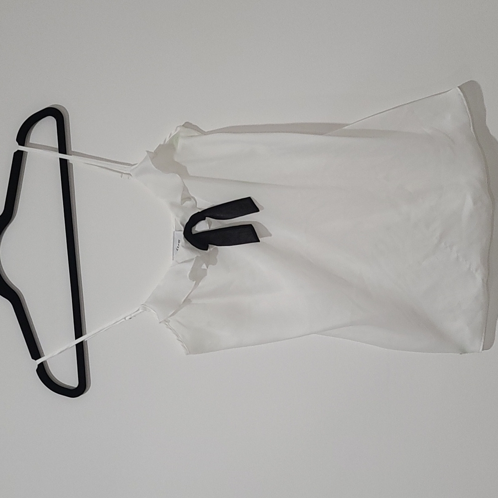 White camisole with black bow